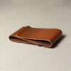 This image shows a detail image of the double-sided hand-hammered copper money clip.