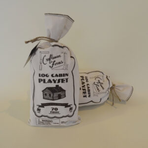 This image shows the outside of the canvas bag that holds our Craftsman Farms Log Cabin Playsets.