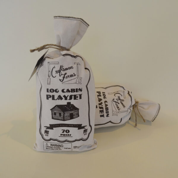 This image shows the outside of the canvas bag that holds our Craftsman Farms Log Cabin Playsets.