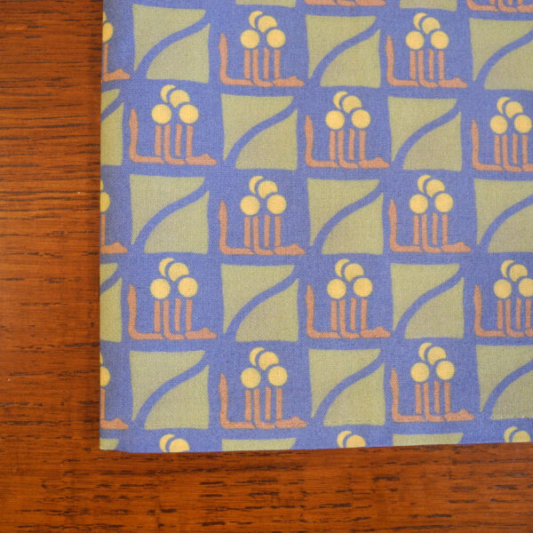 This is the dark blue tea towel in the Leaf and Berry pattern.