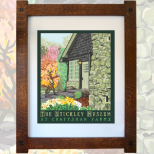 Giclee print of the Log House, which shows the porch door, window and part of the fireplace on the North side of the building. A light is on over the door. There is a stylized tree with red and orange leaves just next to the house. There are yellow and white daffodils in the bottom left corner of the print near the steps to the door. The bottom edge of the print reads "THE STICKLEY MUSEUM AT CRAFTSMAN FARMS." The print has a white mat surrounding it and is secured in a mortise & tenon, quartersawn oak frame with a warm brown stain. The framed print has been superimposed on a close up of the print with the red and orange tree on the left and the fireplace on the right of the print.