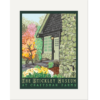 Giclee print of the Log House, which shows the porch door, window and part of the fireplace on the North side of the building. A light is on over the door. There is a stylized tree with red and orange leaves just to the left of the house. There are yellow and white daffodils in the bottom left corner of the print near the steps to the door. The bottom edge of the print reads "THE STICKLEY MUSEUM AT CRAFTSMAN FARMS."