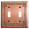 This image shows a copper double light switch plate by James Matteson in the Bungalow Rose pattern. An embossed mackintosh rose can be found in each corner. An embossed line connects each rose and lines the edges of the light switch with a small floral detail in the center of each line.
