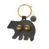 Leather bear with two brass sleigh bells attached. The leather hangs from a brass ring that can be hung on a door knob.