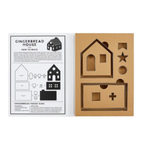 This image shows the contents of the Gingerbread House Cookie Cutter Book Box in the box.