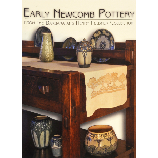 This image shows the cover of the Early Newcomb Pottery book with various pieces of pottery displayed on a wooden dresser