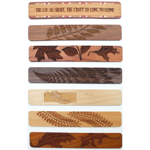 This image shows the variety between the seven engraved wooden bookmarks.